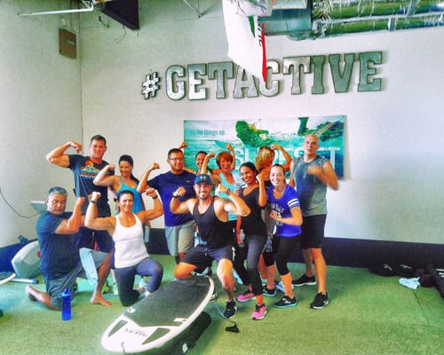 Symmetry Fitness members celebrating together